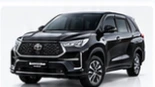 Toyota Innova Zenix hitam tampak dari sisi depan dan samping