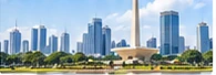 Ilustrasi Monas dan deretan gedung tinggi dengan taman di Jakarta
