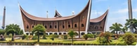 Illustration of a building with Minangkabau-style curved roofs and landscaped grounds in Padang